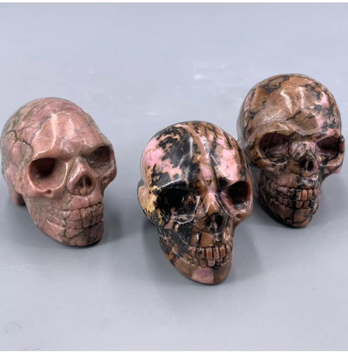 Natural Rhodonite gemstone Skull