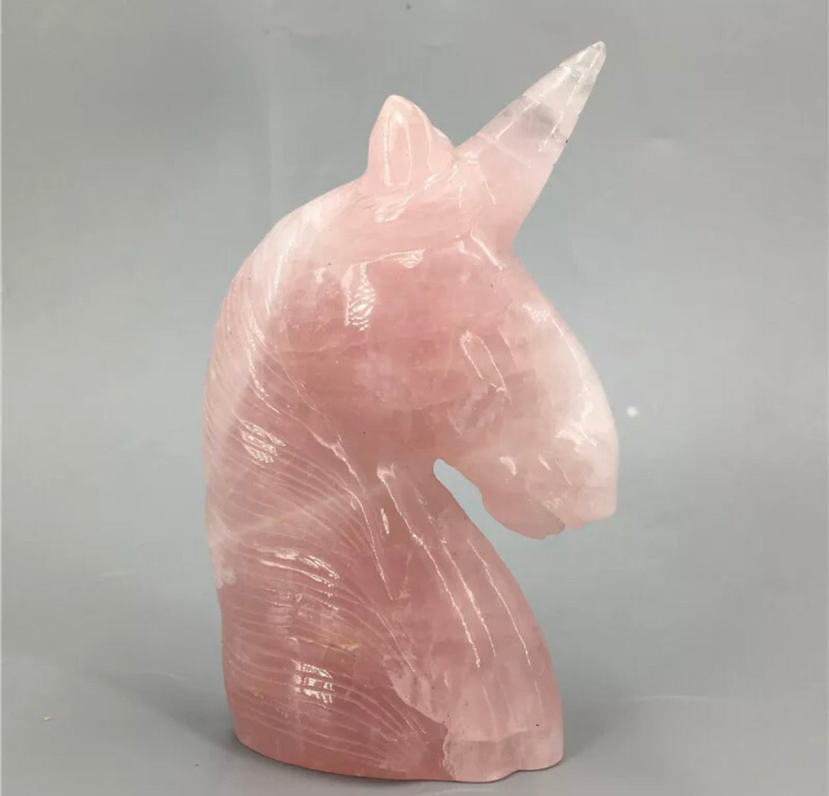 Natural Rose Quartz gemstone carved unicorn