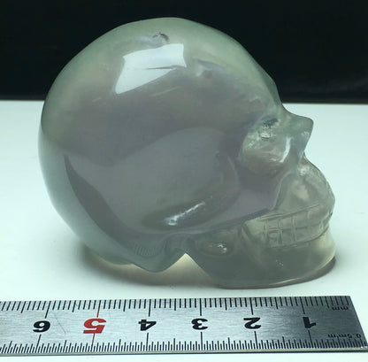 Exquisite fluorite gemstone carved Skull