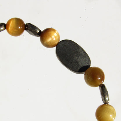 Tiger Eye gemstone and Pyrite skull beaded stretch bracelet