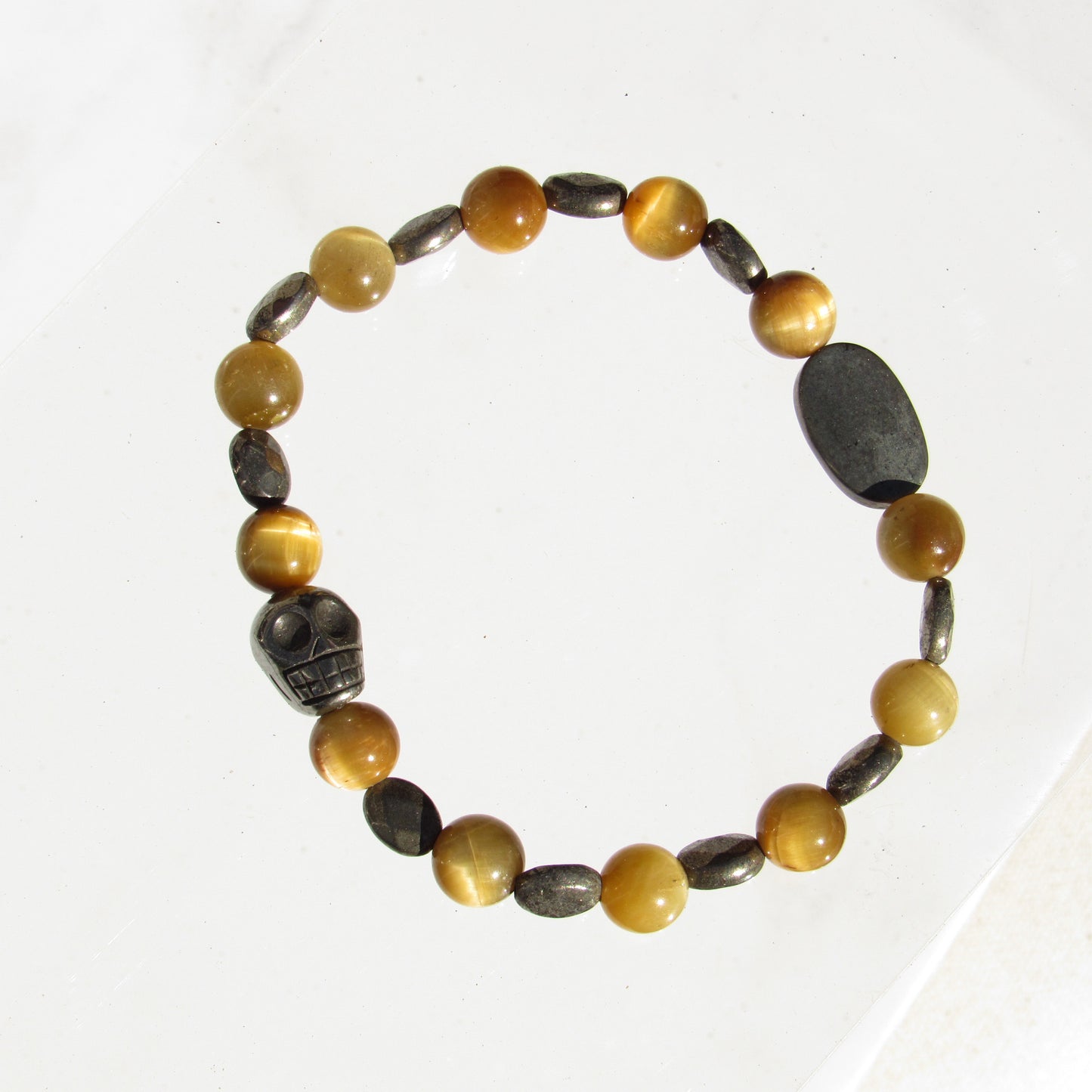 Tiger Eye gemstone and Pyrite skull beaded stretch bracelet