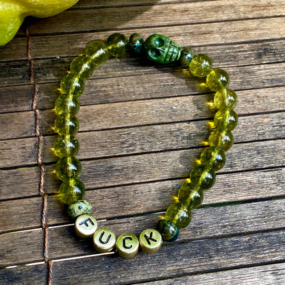 Men’s peridot, green pyrite, green Schiller sheen spar "curse" bracelet