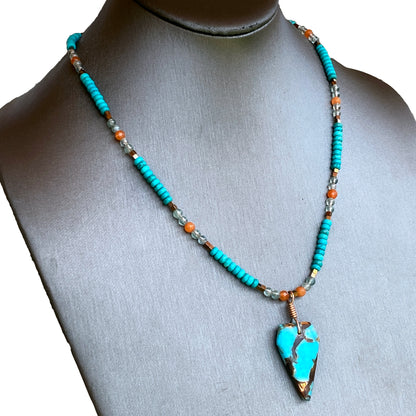 Bornite gemstone arrowhead pendant on Blue Howlite beaded necklace