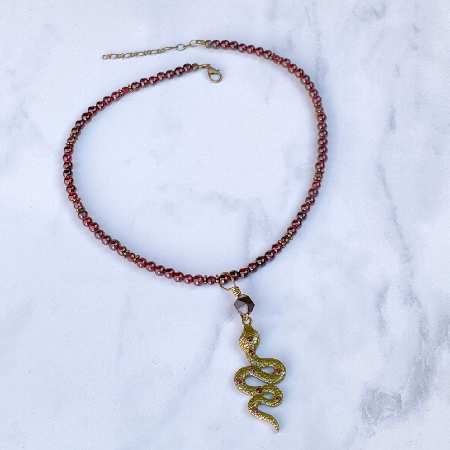 Garnet gemstone and Brass Snake pendant Necklace