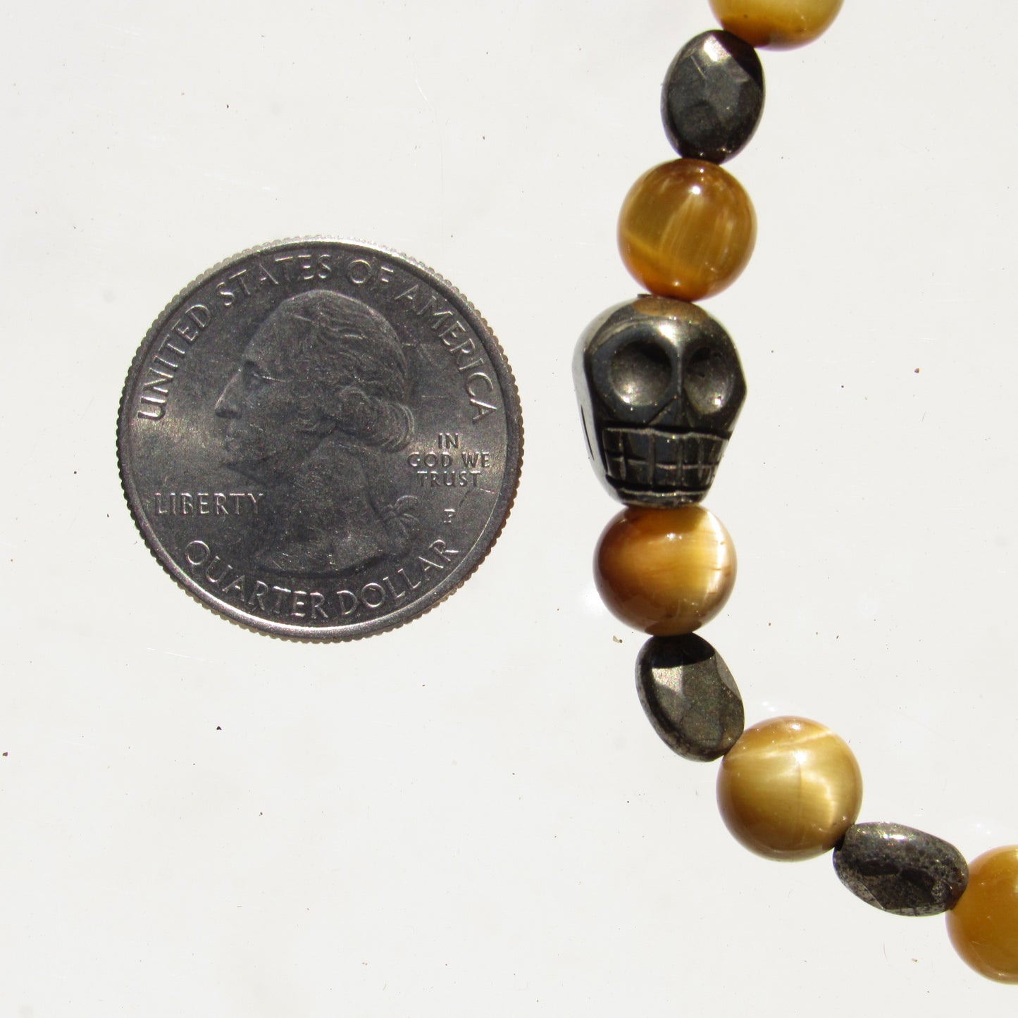 Tiger Eye gemstone and Pyrite skull beaded stretch bracelet