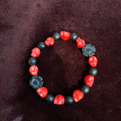Red Skull carved howlite with matte Onyx Gemstone stretch bracelet