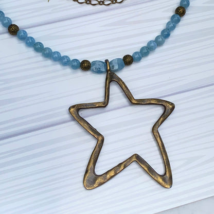 Aquamarine and Brass Star pendant Necklace