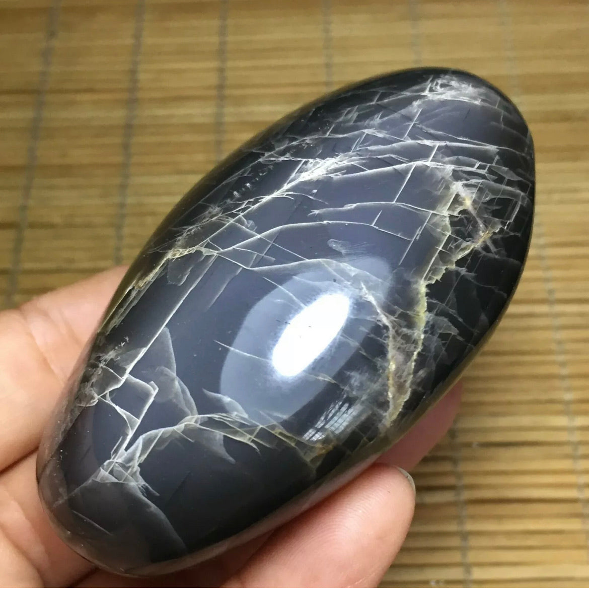 Natural grey moonstone healing palm stone