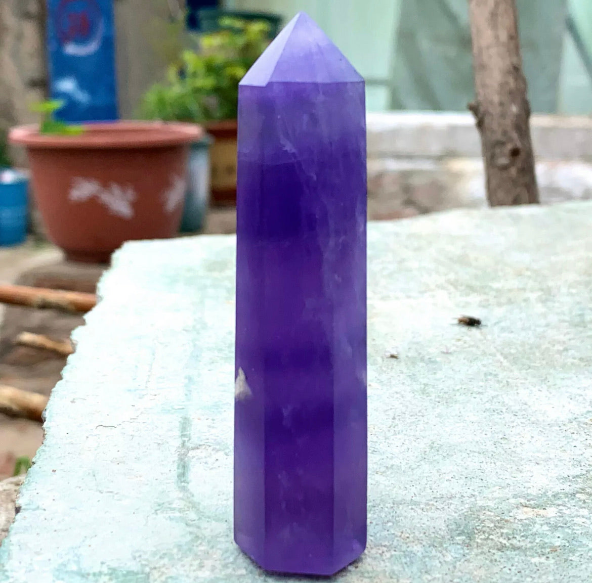 Natural purple fluorite gemstone tower point aura wand