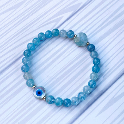 Aquamarine with Mother of Pearl Evil Eye stretch Bracelet