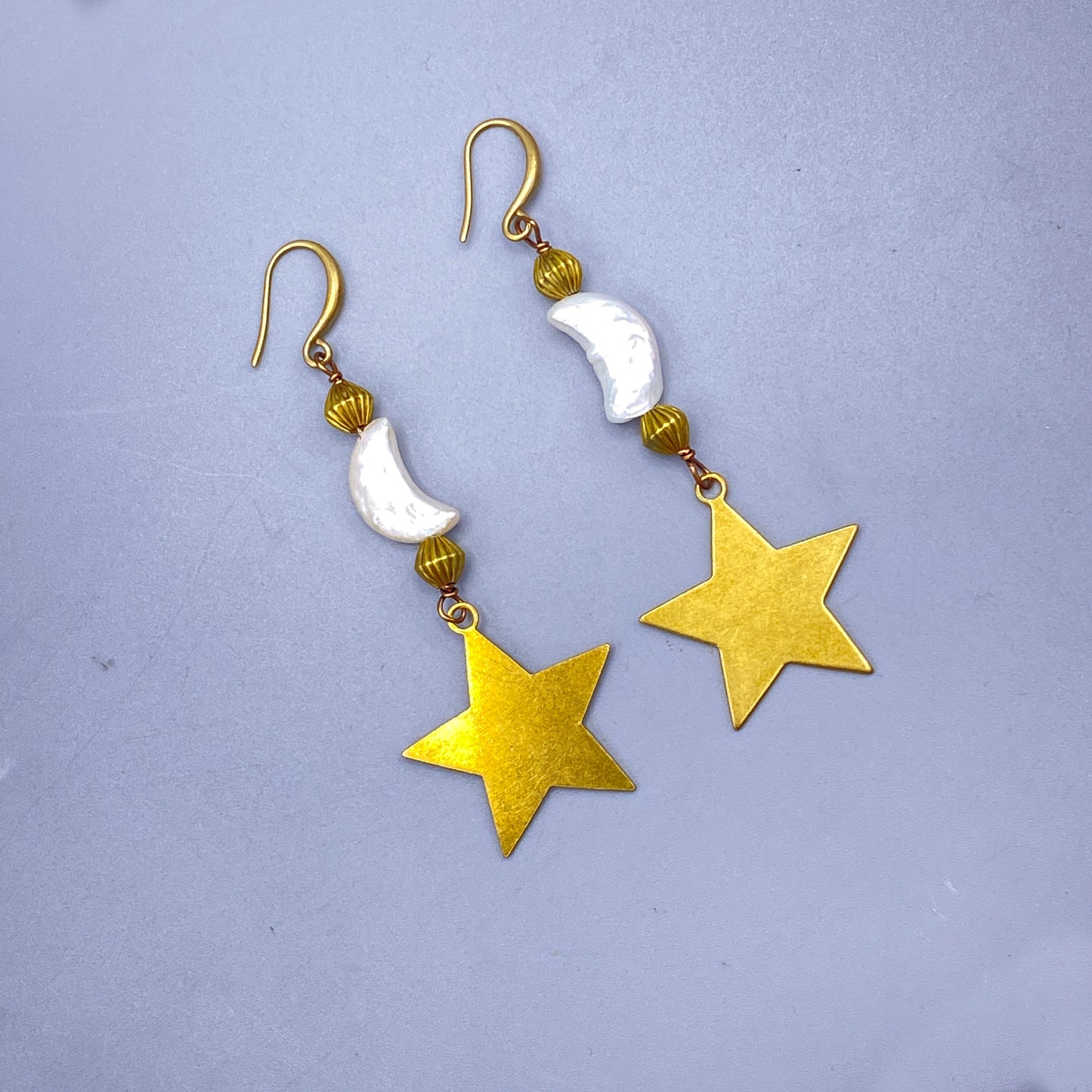 Pearl Moons and Brass Star Dangle Earringa