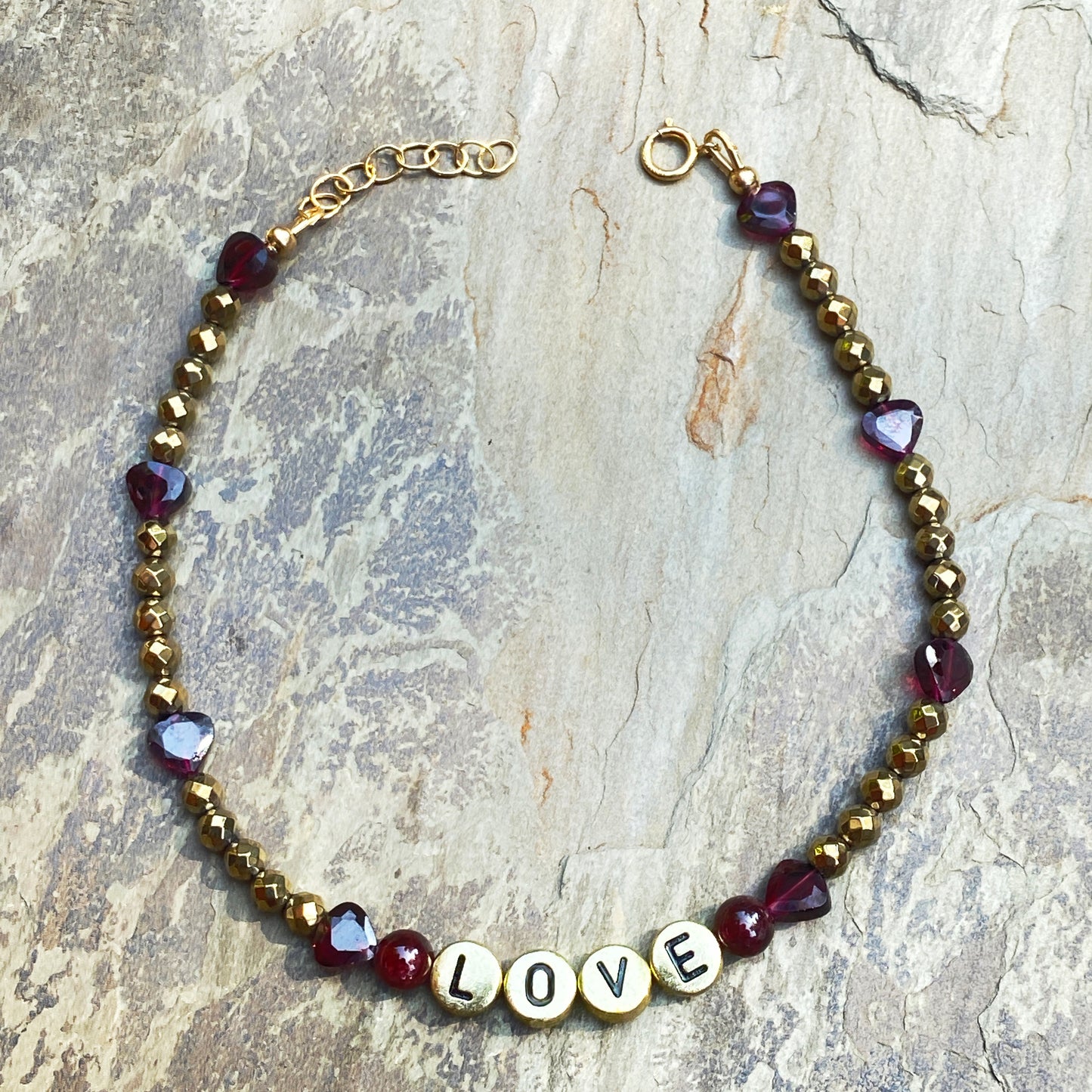 Garnet and hematite beaded gemstone “love” anklet with heart shaped garnets