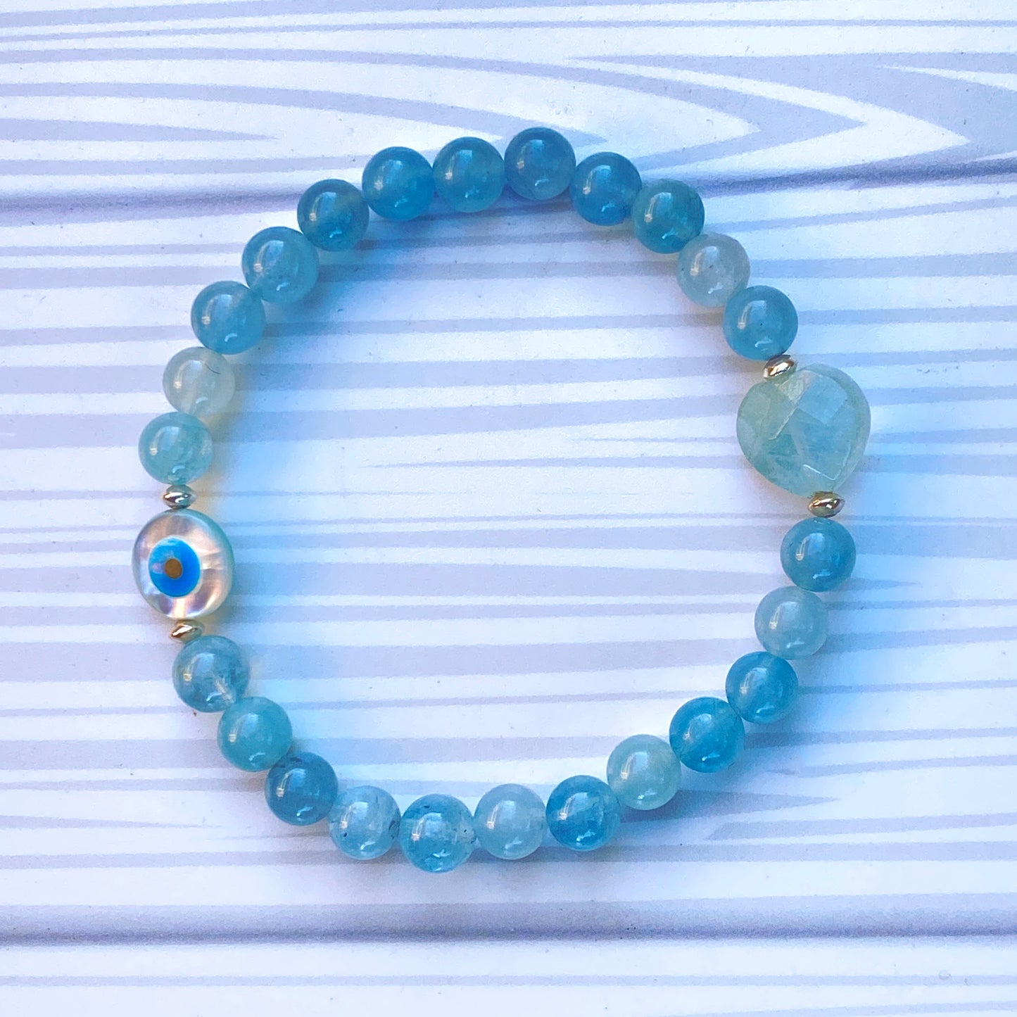 Aquamarine with Mother of Pearl Evil Eye stretch Bracelet