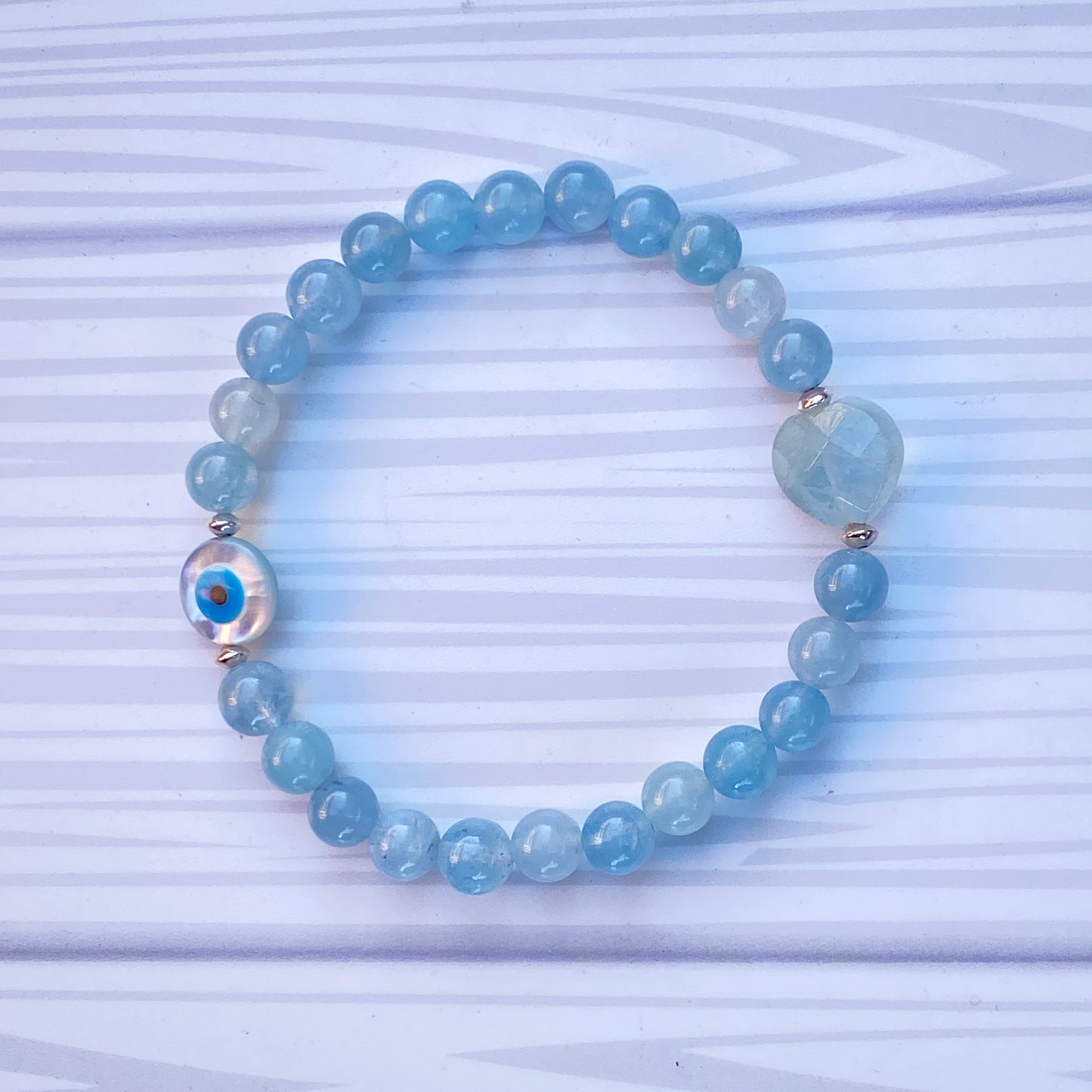 Aquamarine with Mother of Pearl Evil Eye stretch Bracelet