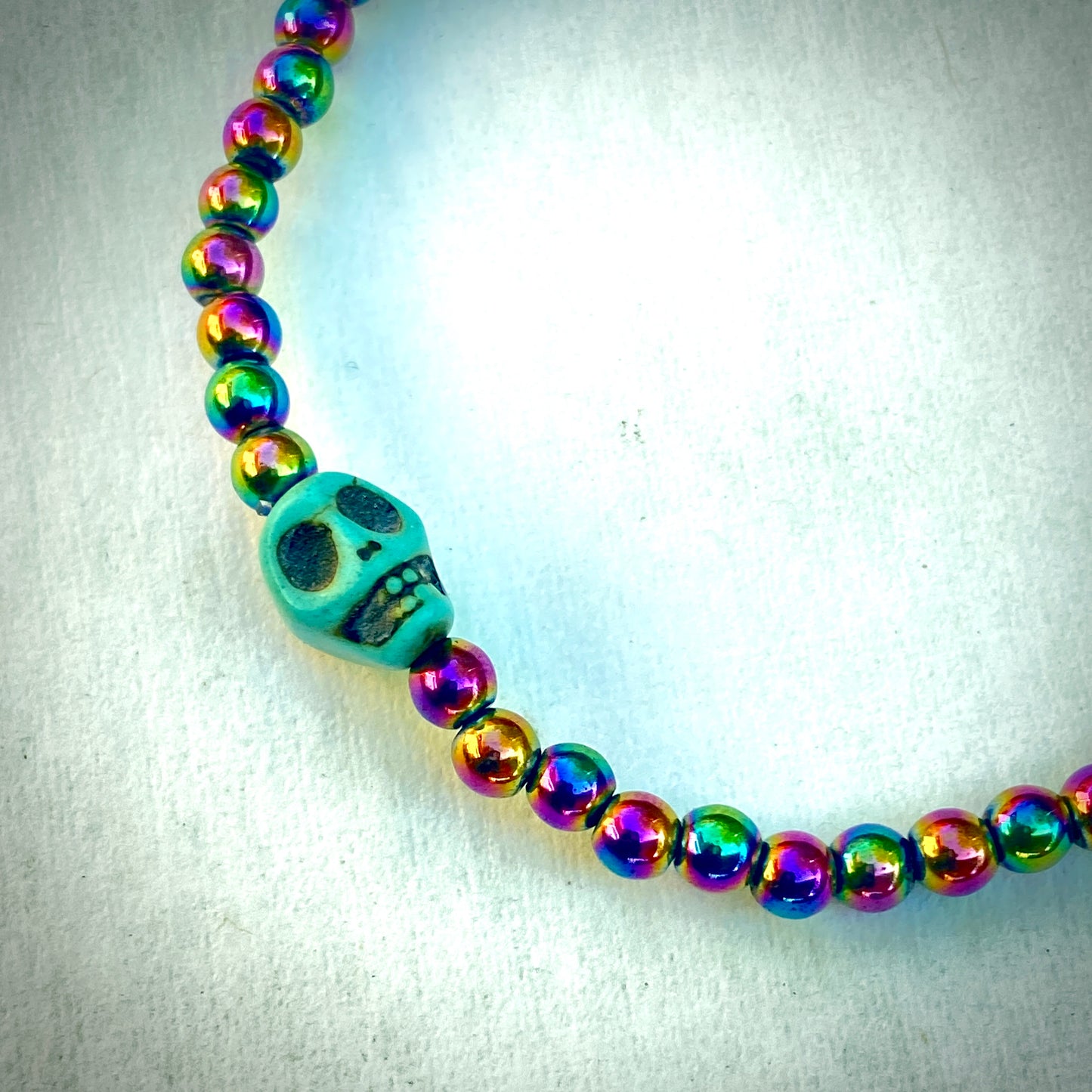 Rainbow Hematite gemstone with Howlite Skull bracelet