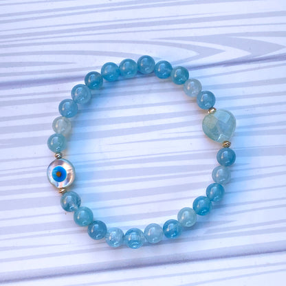 Aquamarine with Mother of Pearl Evil Eye stretch Bracelet