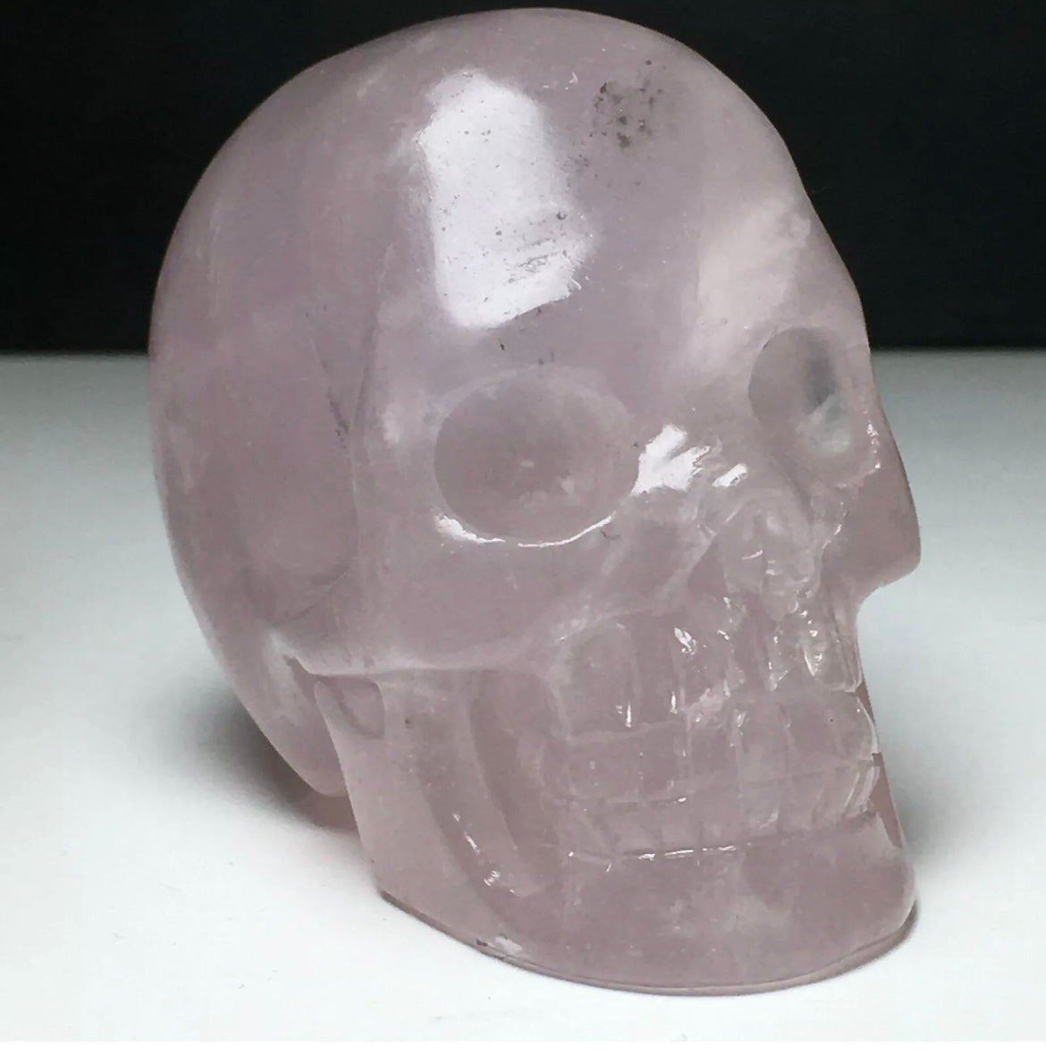 Natural Rose Quartz gemstone Carved Skull Figurine