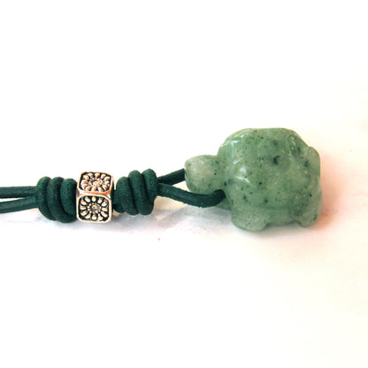 Jade Turtle gemstone on green leather with Sterling Silver