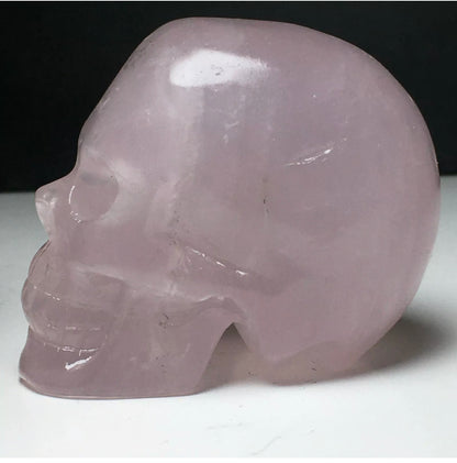 Natural Rose Quartz gemstone Carved Skull Figurine