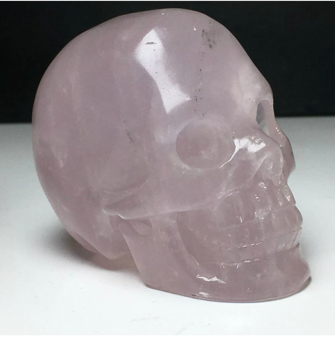 Natural Rose Quartz gemstone Carved Skull Figurine