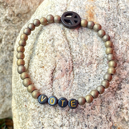 Men’s Matte Gold Hematite “Vote” With Howlite Peace Sign