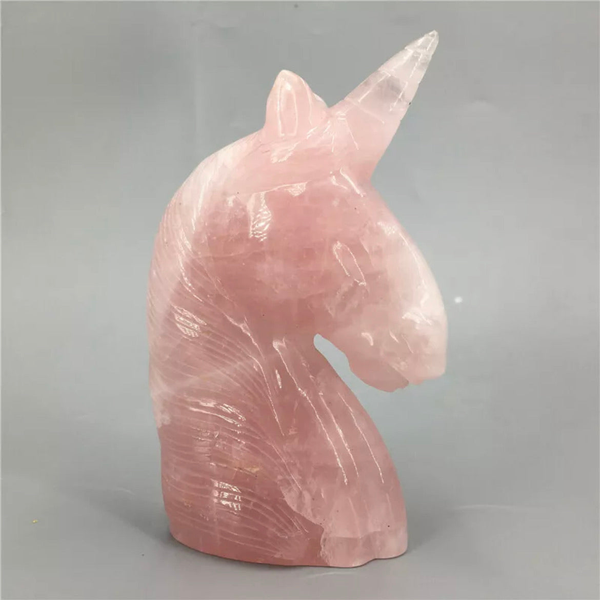 Natural Rose Quartz gemstone carved unicorn