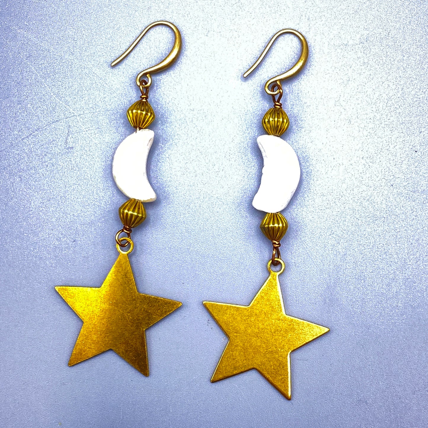 Pearl Moons and Brass Star Dangle Earringa