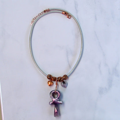 Amethyst gemstone carved Ankh pendant with copper on leather necklace