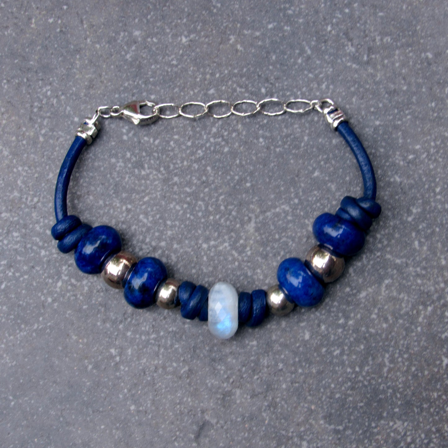 Moonstone center stone with Lapis Lazuli gemstones, and Sterling Silver leather bracelet