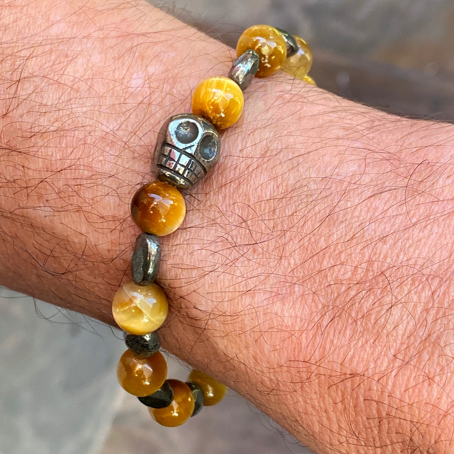 Tiger Eye gemstone and Pyrite skull beaded stretch bracelet