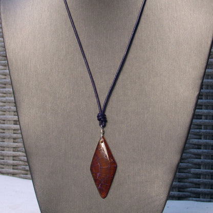 Dragon’s Vein Agate gemstone, Sterling Silver, and Leather