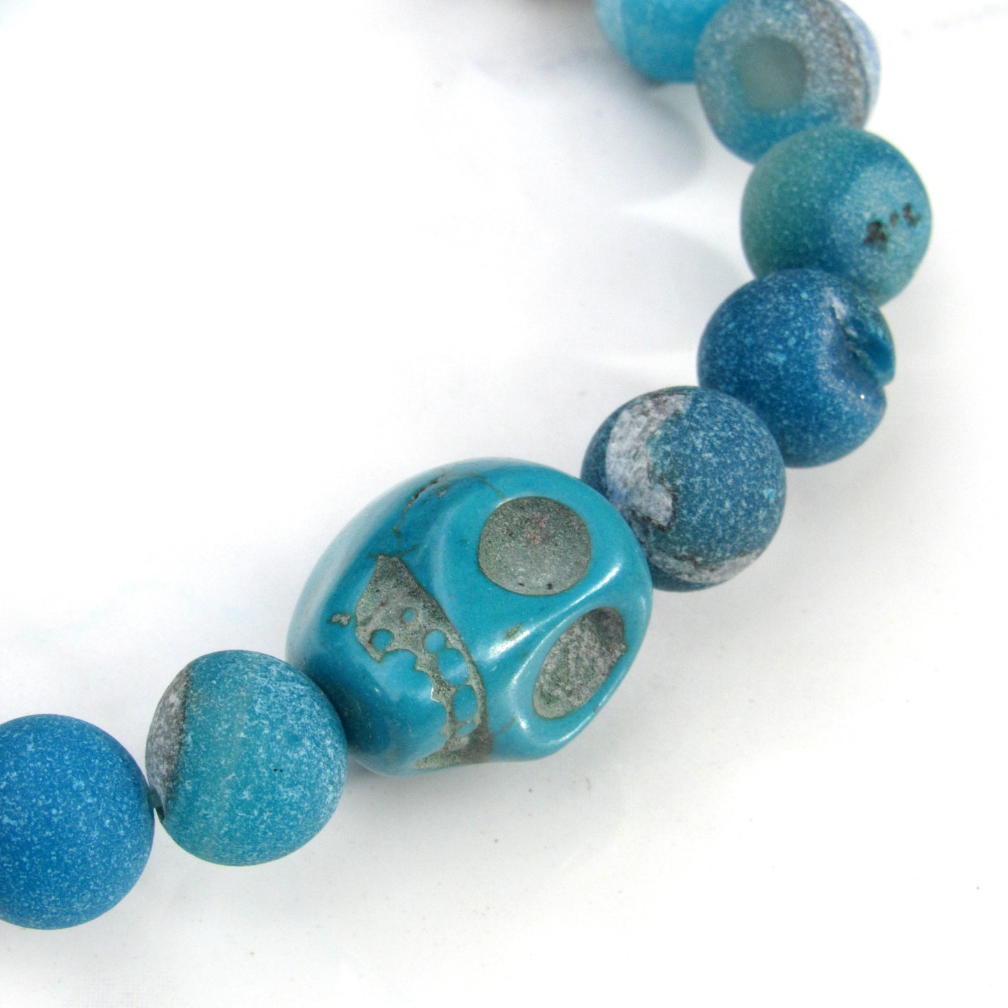 Blue Druzy Agate gemstones and Howlite Skull Stretch Bracelet