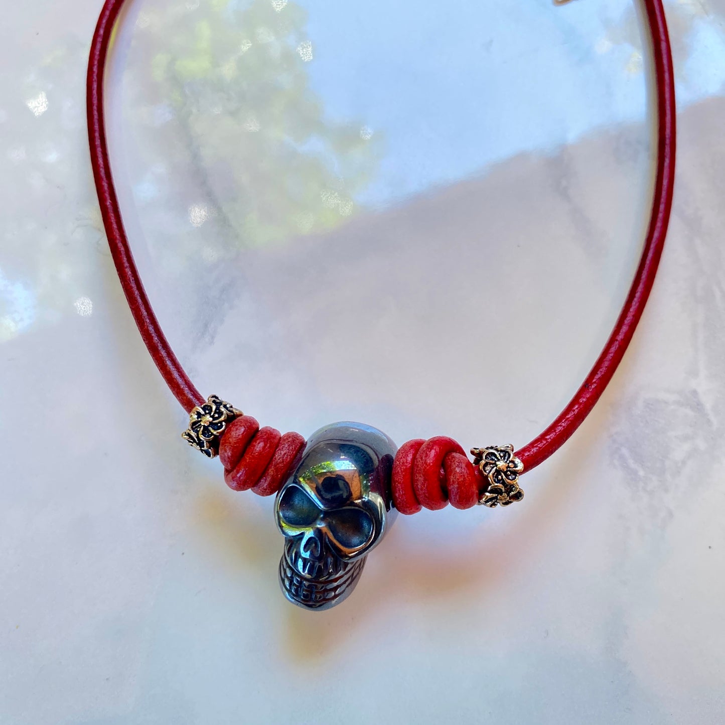 Hematite gemstone Skull and Sterling Silver on Leather Necklace