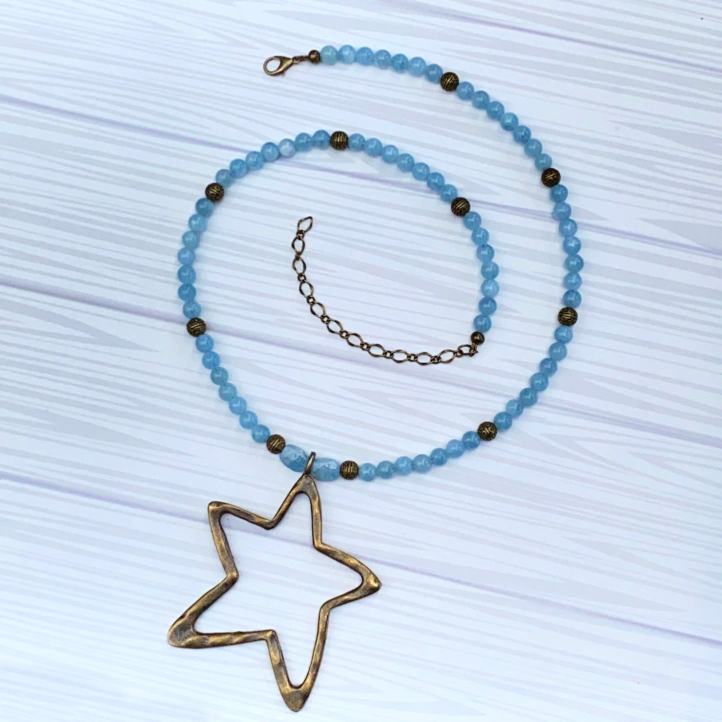 Aquamarine and Brass Star pendant Necklace