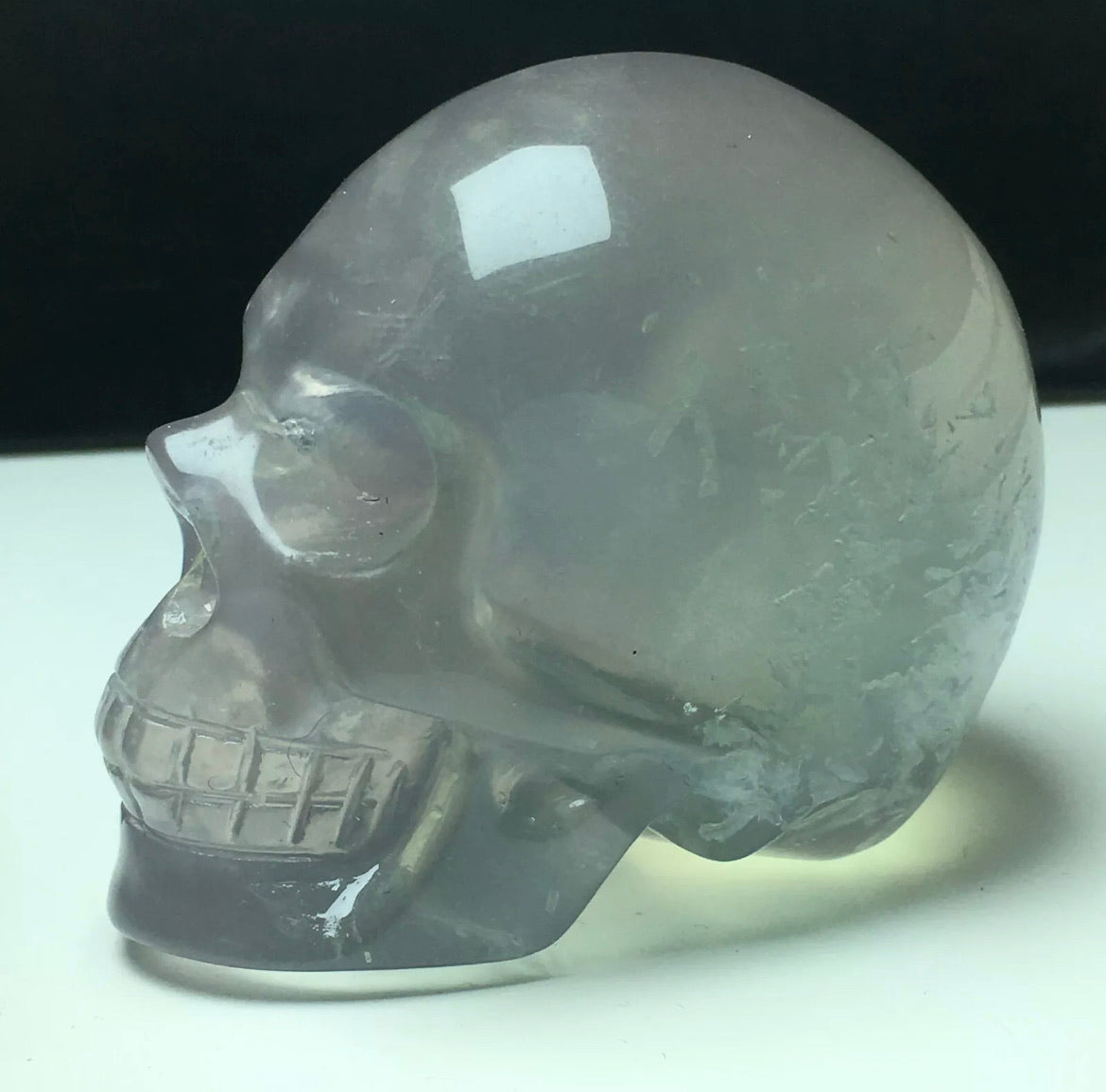 Exquisite fluorite gemstone carved Skull