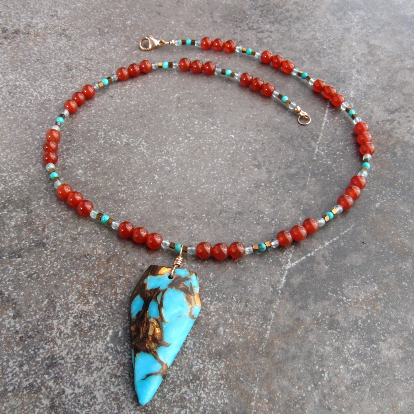 Bornite Gemstone pendant on carnelian, apatite, and hematite Beaded Necklace