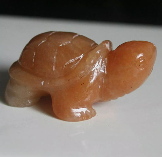 Hand carved orange aventurine gemstone turtle