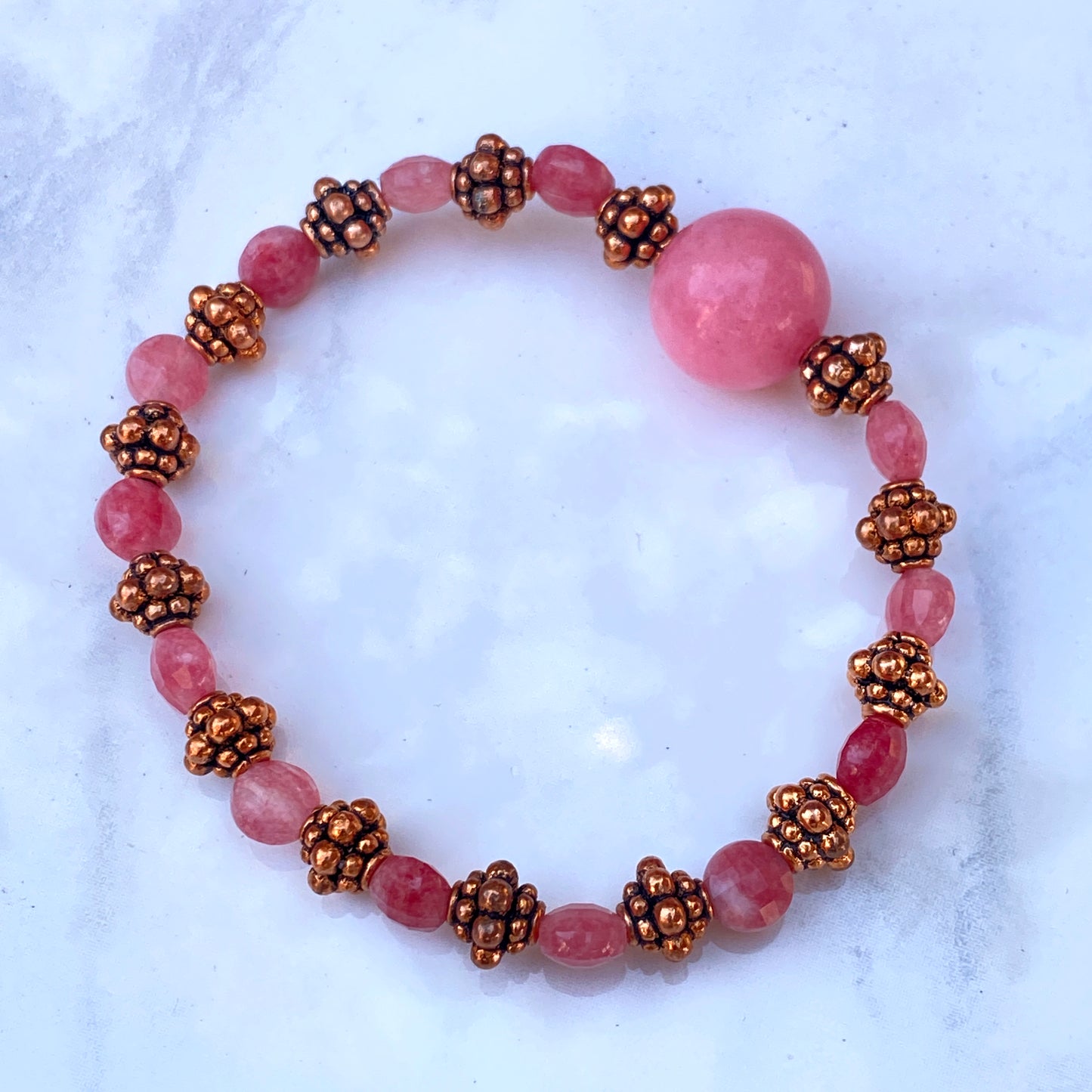 Rhodochrosite gemstone and copper stretch bracelet