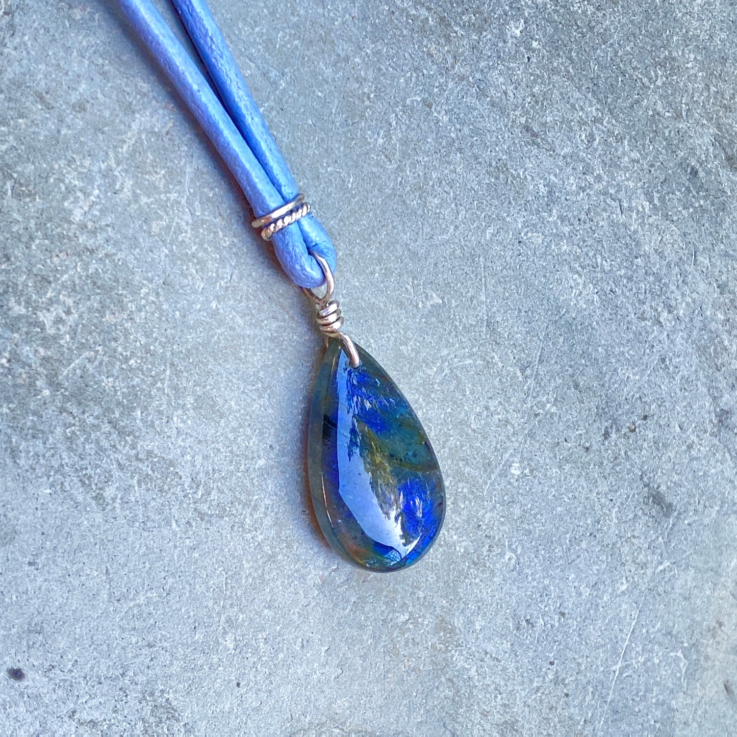 Blue Flame Labradorite gemstone Hand Wrapped on Leather W/ Sterling Silver