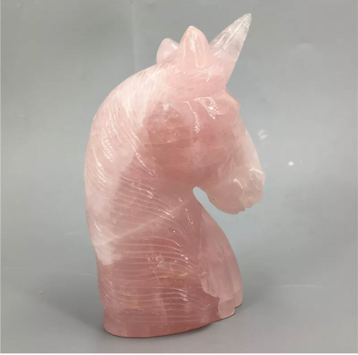 Natural Rose Quartz gemstone carved unicorn