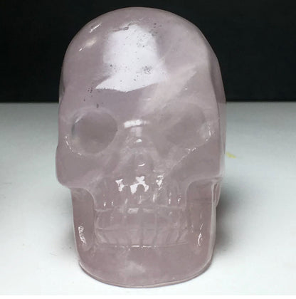 Natural Rose Quartz gemstone Carved Skull Figurine