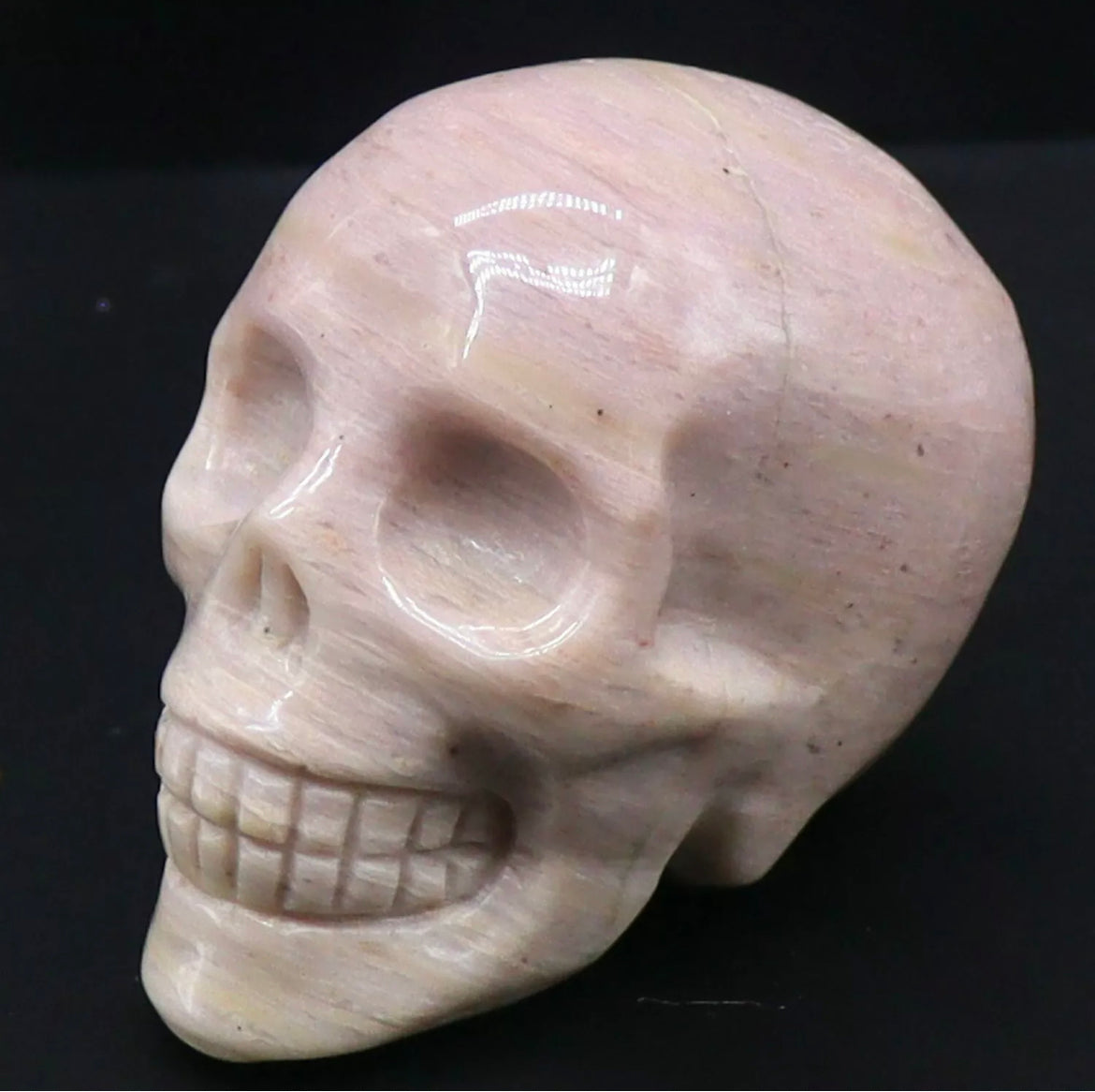 Natural Rhodonite Skull