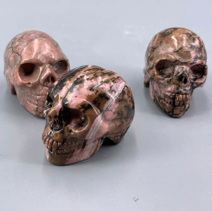 Natural Rhodonite gemstone Skull