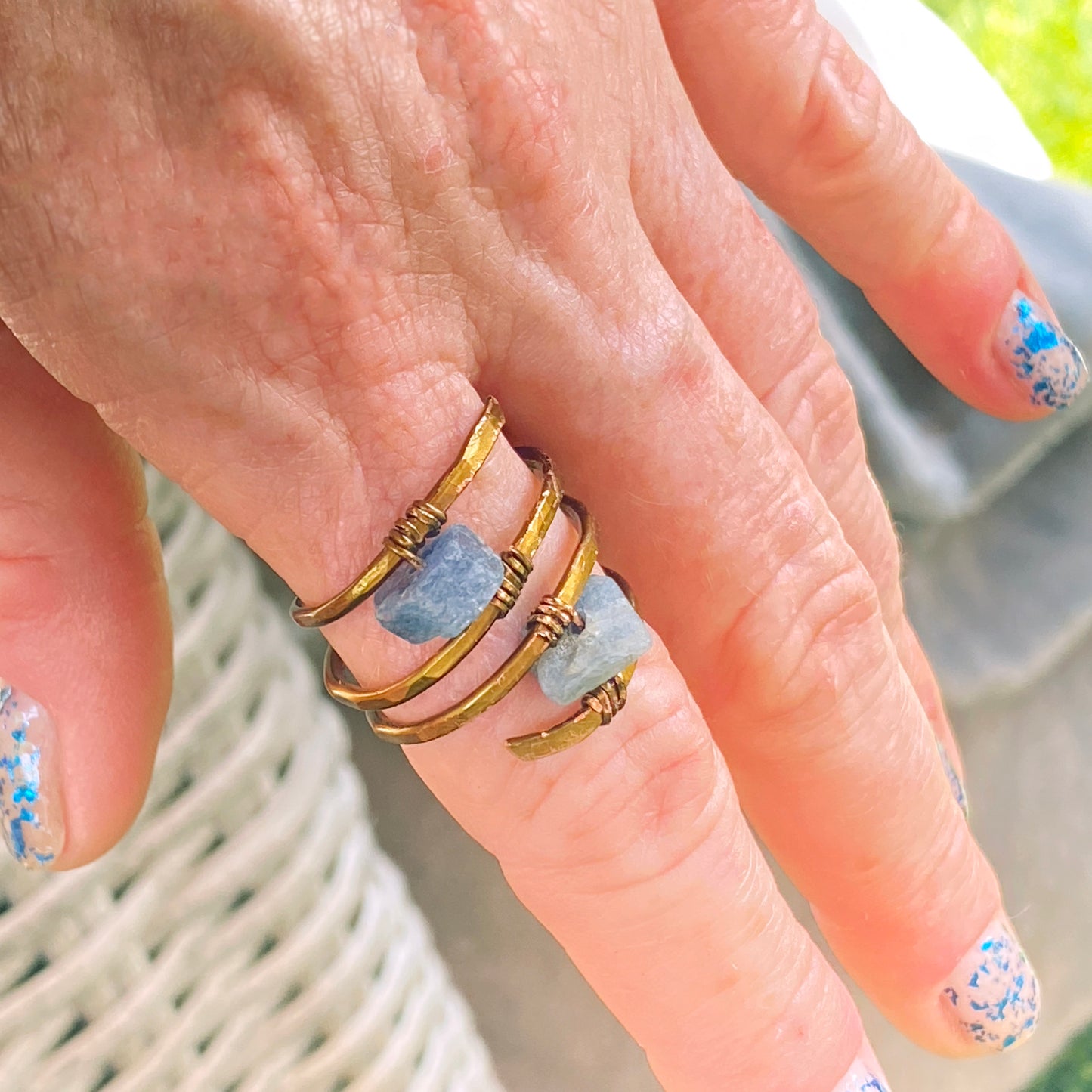 Blue Sapphire gemstone on hand hammered Bronze Ring.